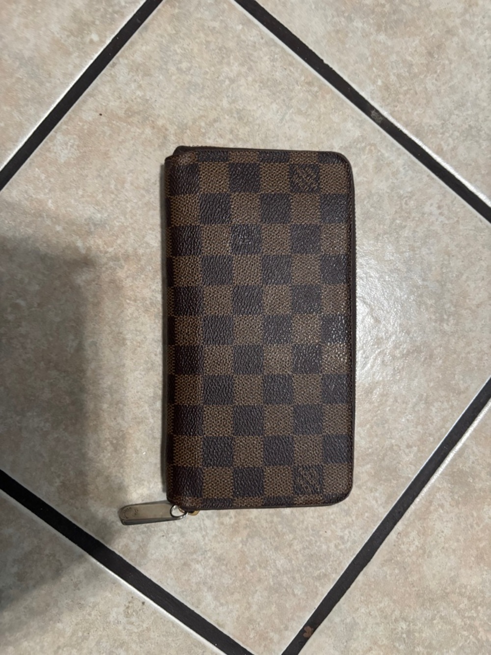 Louis Vuitton Zippy Wallet in Damier Ebene canvas
